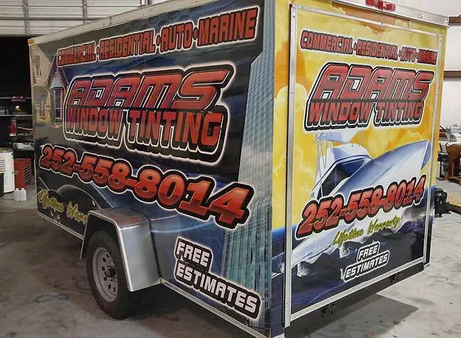 box trailer wrap for adams window tinting by elite sign services