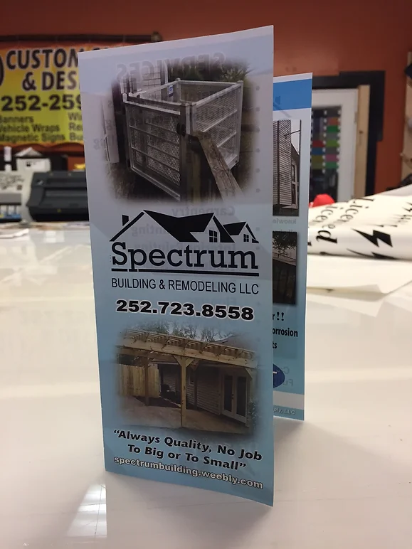 pamphlet for spectrum construction printed by elite sign services